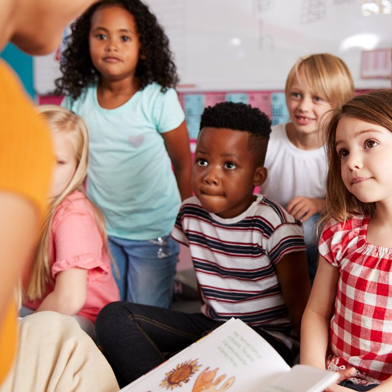 Students and Teacher Reading